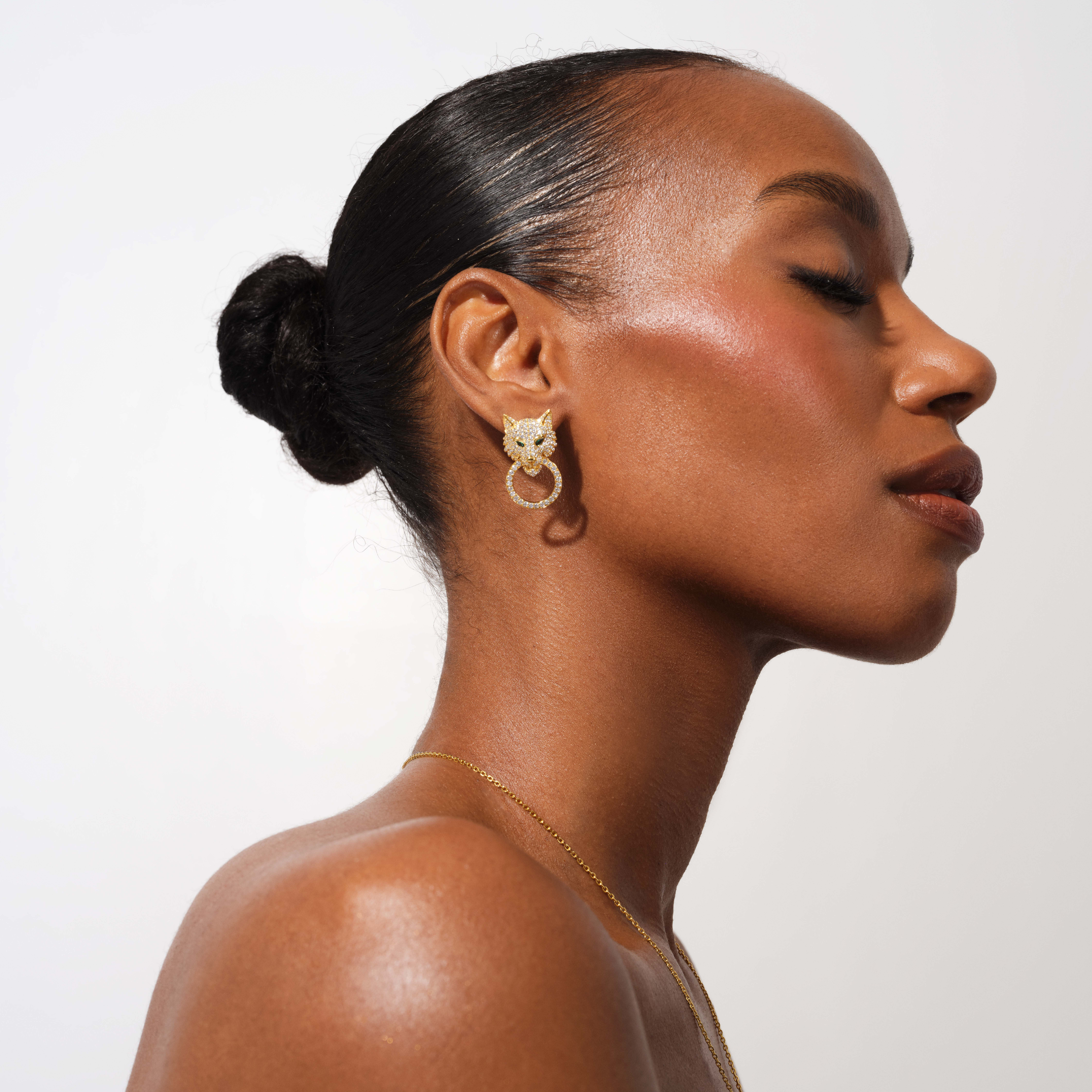 AJÉ Stud Earrings
